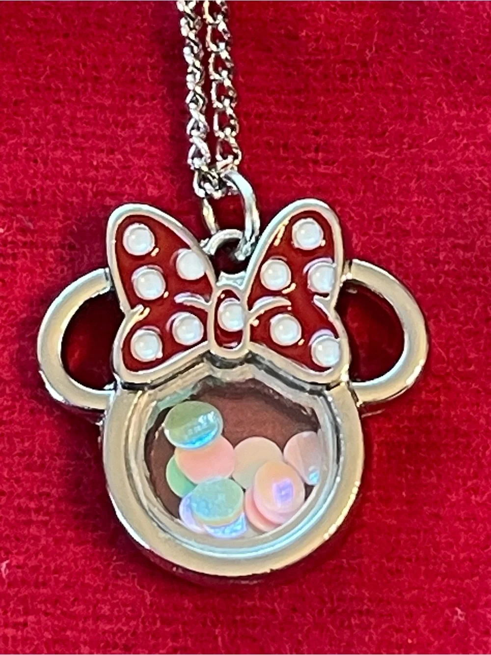 Minnie Mouse shaker charm on silver chain.